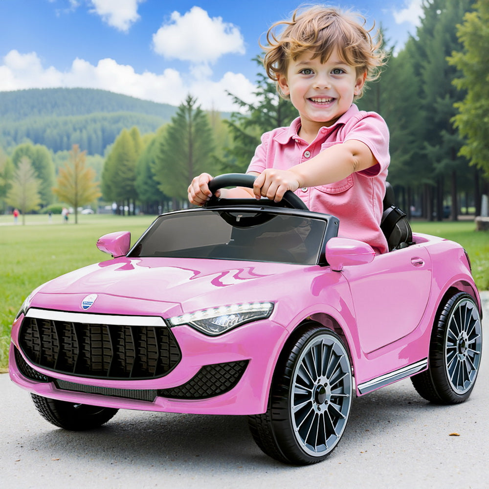 Rigo Kids Electric Ride-On Car – 12V Battery with Headlights, Music & Remote (Pink)