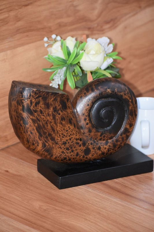 Hand carved wooden shell on stand