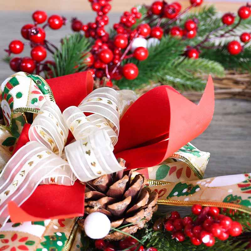Christmas Wreath with Pine Cones, Red Berries, and Festive Bow